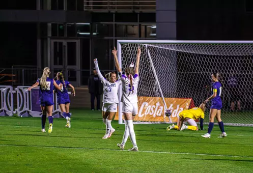 Lily Blum and Simone Packer celebrating