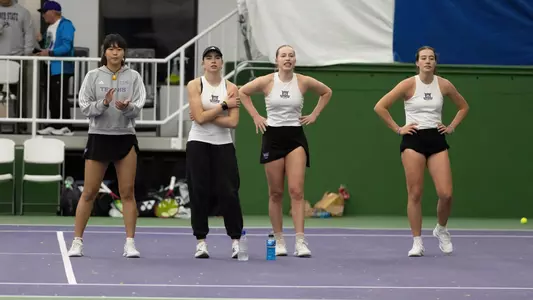 4 Wildcats look on during a match against Idaho