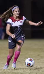 Haley Baldridge chases down a ball on Friday night against Marshall.