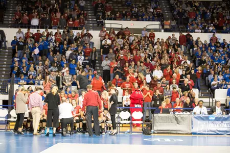 Team huddle NCAA Tournament crowd