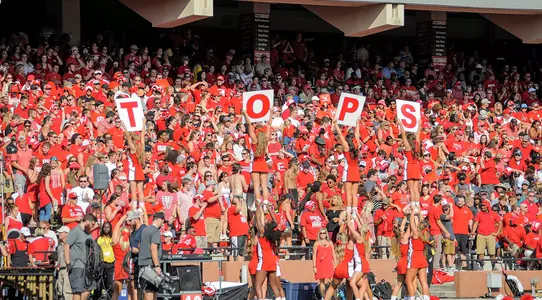 TOPS signs cheerleaders cheer football crowd fans
