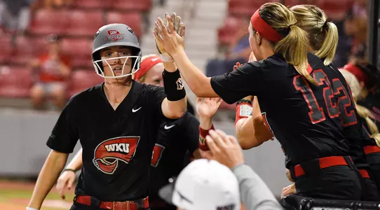 High fives Morgan McElroy dugout 2018