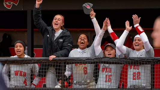 Kelsey Aikey Taylor Davis Taylor Sanders Macy Murphy dugout celebration