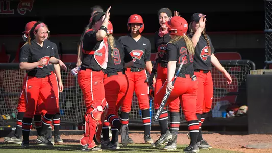 Paige Carter team celebration dugout