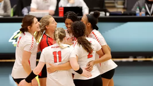 WKU team huddle C-USA Tournament