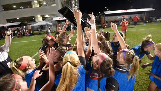 Soccer Team with C-USA Trophy