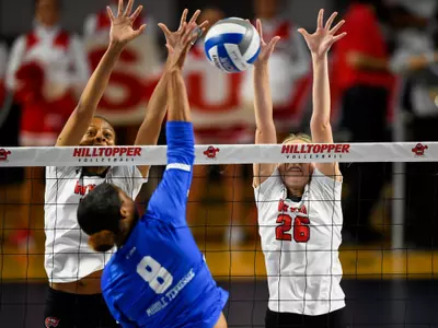Middle hitter Lauren Matthews (5) and Outside hitter Katie Howard (26). of the WKU Hilltoppers at E. A. Diddle Arena on October 23, 2022 in Bowling Green, KY. Photo by Steve Roberts/WKU Athletics