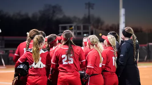 WKU Softball Hilltopper Classic team huddle