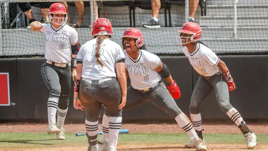Team celebration softball vs. Marshall Taylor Sanders