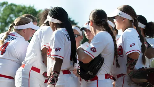 Team huddle softball C-USA Tournament