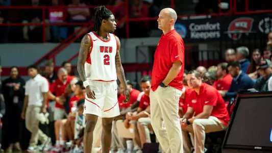 Guard Don McHenry(2) and Head coach Steve Lutz of the WKU Hilltoppers at E.A. Diddle Arena on November 6, 2023 in Bowling Green, KY. (Photo by Steve Roberts/WKU Athletics)