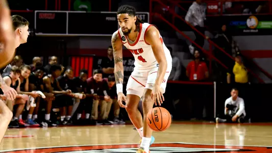 Guard Khristian Lander (4) | Photo by Steve Roberts