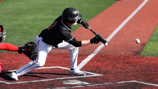 Eli Burwash lays down bunt