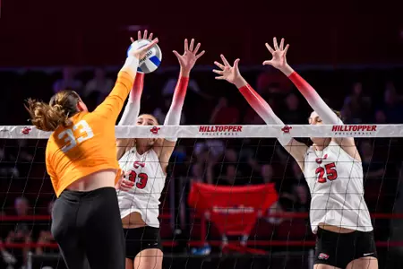 Out side hitter Kenadee Coyle (33) and Middle hitter Izzy Van De Wiele | Photo by Steve Roberts