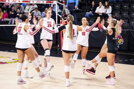 Middle hitter Izzy Van De Wiele, Outside hitter Alivia Skidmore (17), Setter Callie Bauer (14), Defensive specialist Abby Schaefer (15), Defensive specialist Tayler Baron (2), Defensive specialist Kaira Knox (5), Outside hitter Faith Young (22) | Photo by Savannah Philpot