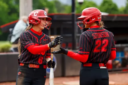 WKU Hilltoppers outfielder Kennedy Stinson (22), WKU Hilltoppers infielder Morgan Sharpe (6) | Photo by Savannah Philpot