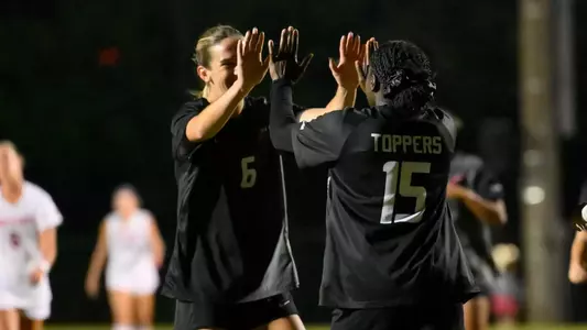 Midfielder April McDonald (6) and Forward Danielle Lewin (15) | Photo by Steve Roberts