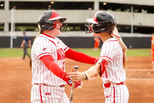 WKU Hilltoppers infielder Maci Masters (30), WKU Hilltoppers outfielder Kendle White (21) | Photo by Savannah Philpot