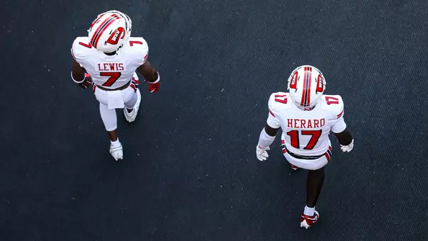 File photo featuring safety Jaylen Lewis and safety Dave Herard walking on the field during the 2025 season.