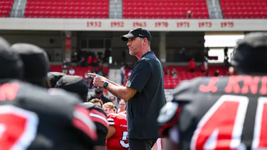 WKU Football Head Coach Tyson Helton speaks with the team after a 2026 spring practice.