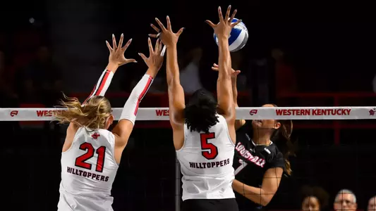Outside hitter Eliza McNight (21) and Defensive specialist Kaira Knox (5) | Photo by Steve Roberts