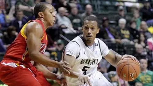 Men Defeat Miami 67-59
