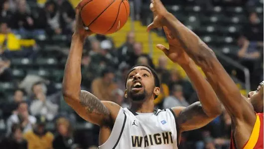 Men Defeat Mount St. Joseph