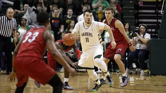 Men Hold Off Miami 68-59