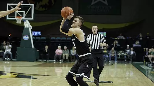 Men Defeat North Dakota 83-79