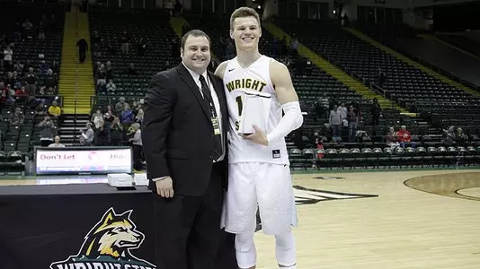 Men Claim MABCC Title; Benzinger MVP