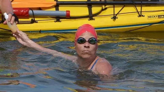 Former Raider Continues Swmiming