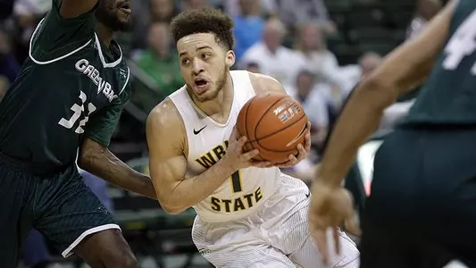 Mitchell's Triple-Double Lifts Raiders Past Green Bay