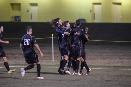 men's soccer celebration