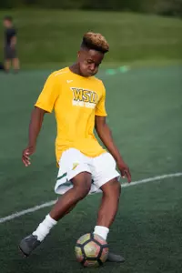 Joseph Raasch warms up