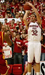 Cougars Cruise Past Trojans, 74-50