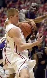 Cougars Fall Short To Huskies, 59-55