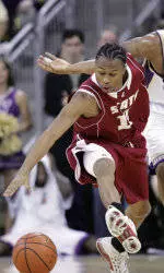 Cougars Limit Husky Offense, But Fall 66-48