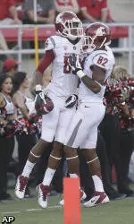 Cougars Beat Rebels, 35-27