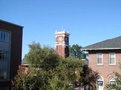 The Bryan Hall Clock Tower looking southwest from the roof of Holland Library. B