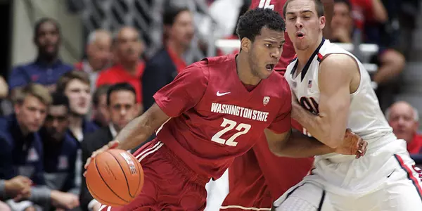 Washington States' Royce Woolridge (22)