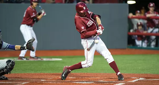 Cameron Frost drives a triple against Washington