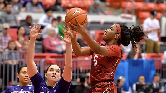 Kayla Washington gets to the basket against #8/7 Washington for two of her 11 second-half points.