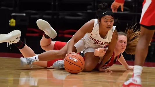 Chanelle Molina fights for a loose ball against Nebraska