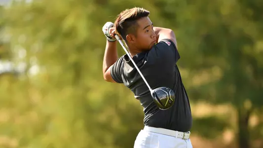 Io Palmer with students and environmental portrait in Ceramics studio
