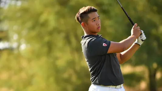 Io Palmer with students and environmental portrait in Ceramics studio