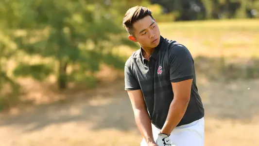 Io Palmer with students and environmental portrait in Ceramics studio