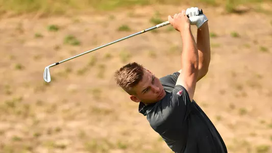 Io Palmer with students and environmental portrait in Ceramics studio