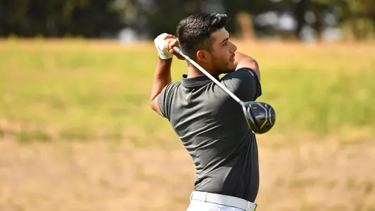 Io Palmer with students and environmental portrait in Ceramics studio