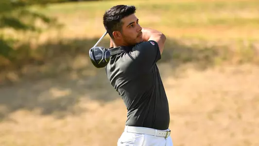 Io Palmer with students and environmental portrait in Ceramics studio