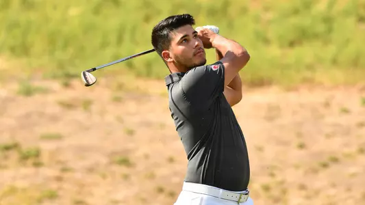 Io Palmer with students and environmental portrait in Ceramics studio